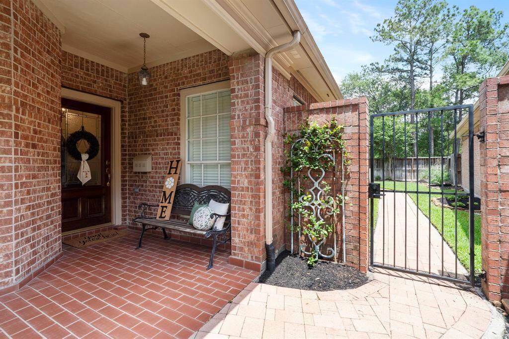 The covered front porch has plenty of space for a sitting area.