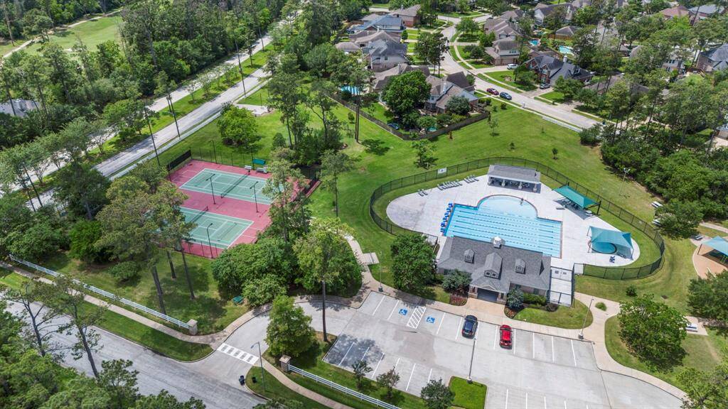 Longwood Village has many amenities including a community pool and tennis courts.
