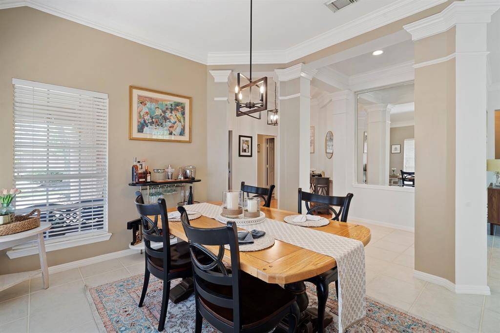 The room is enhanced by acaptivating chandelier.