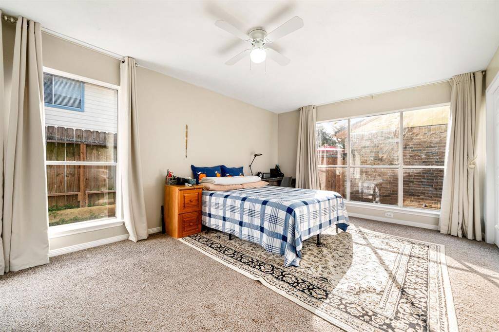 Downstairs primary suite with garden views and peaceful
