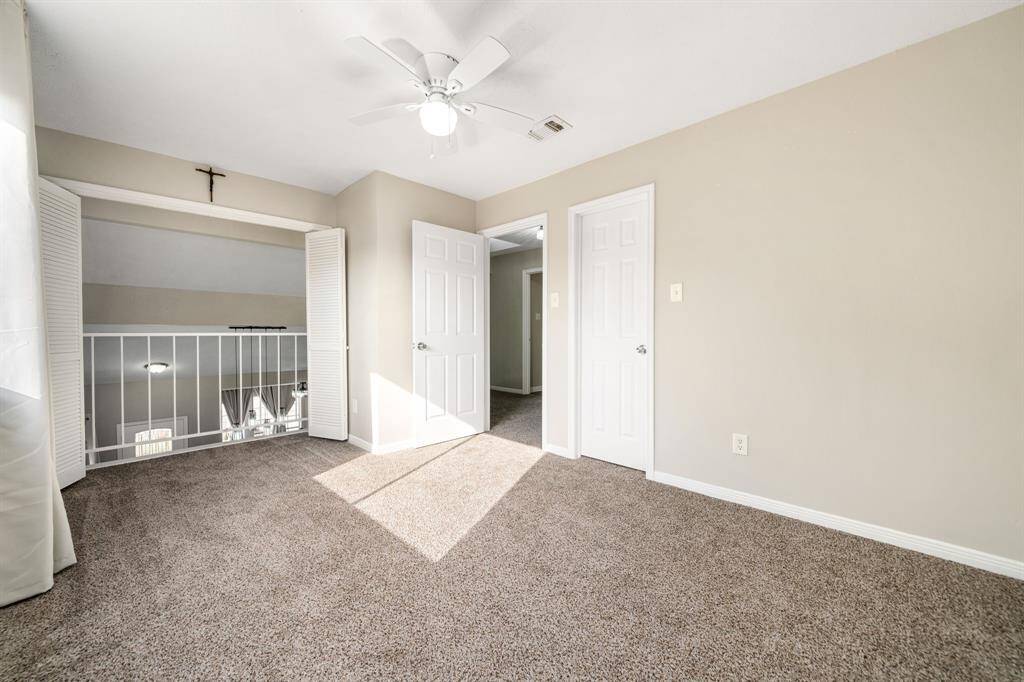 Open loft-style view overlooking the first floor, bringing light and connection.