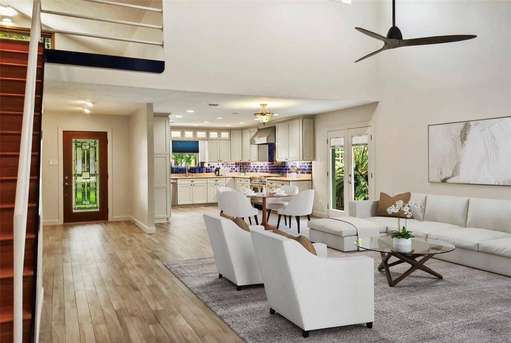 Tall ceilings and Family Room open to the Gourmet Kitchen.