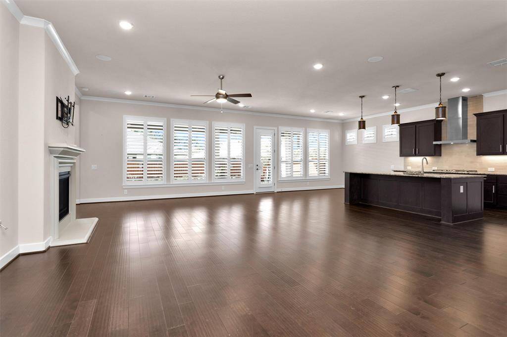 You are greeted by tons of natural light and beautiful wood floors.