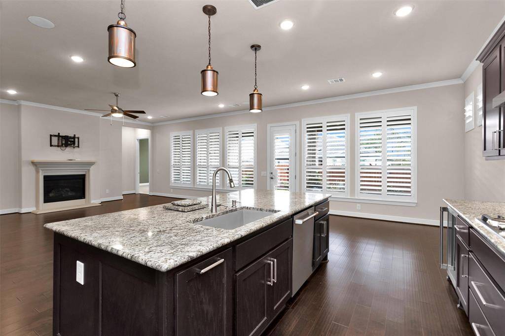 The kitchen is opened up to the living room and dining room, perfect for entertaining.