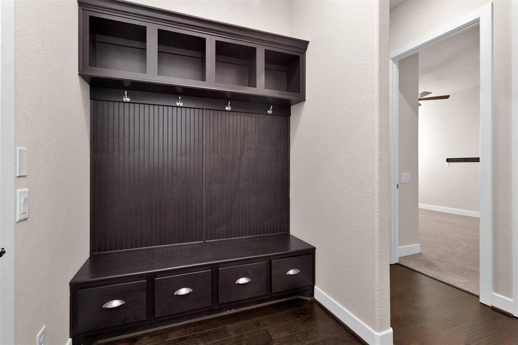 Beautiful built in storage off the entry from the garage, perfect for shpes/coats.