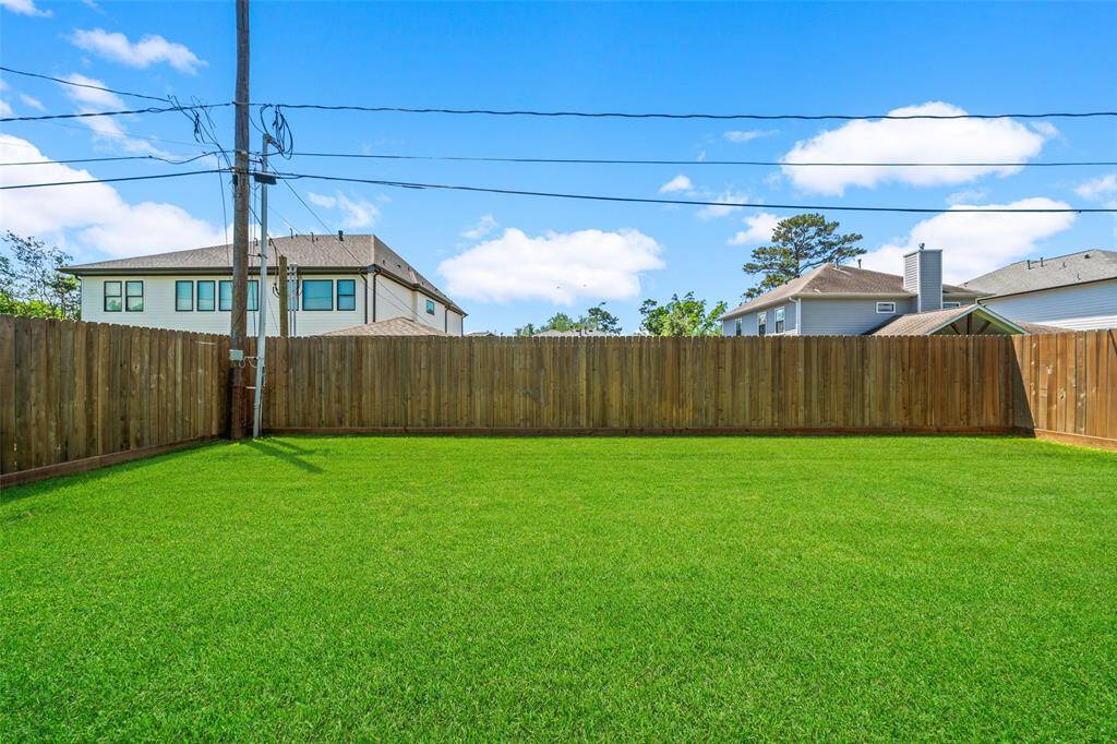 Cedar fence with plenty of privacy.