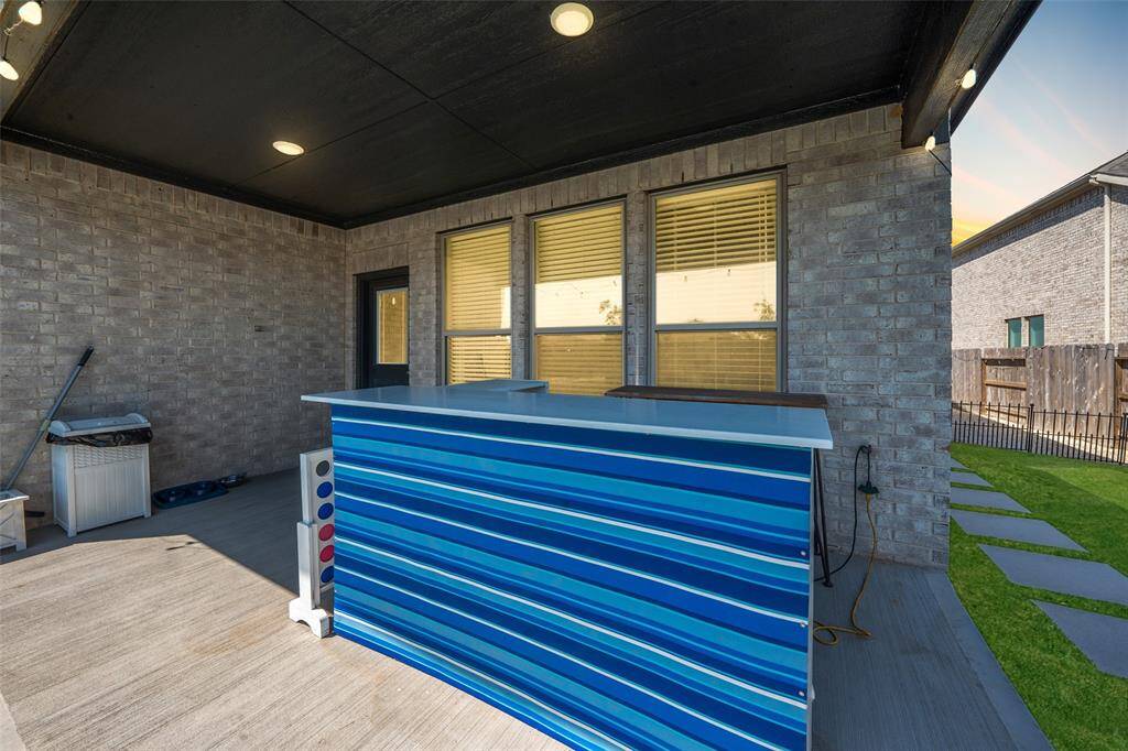 Cheers to outdoor fun—the patio bar is perfect for hosting friends and enjoying the great backyard space.