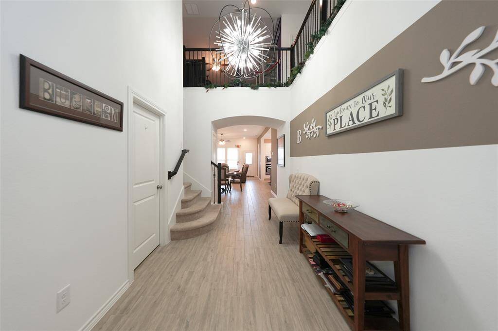 Elegant entryway foyer sets the tone for a warm and welcoming home.