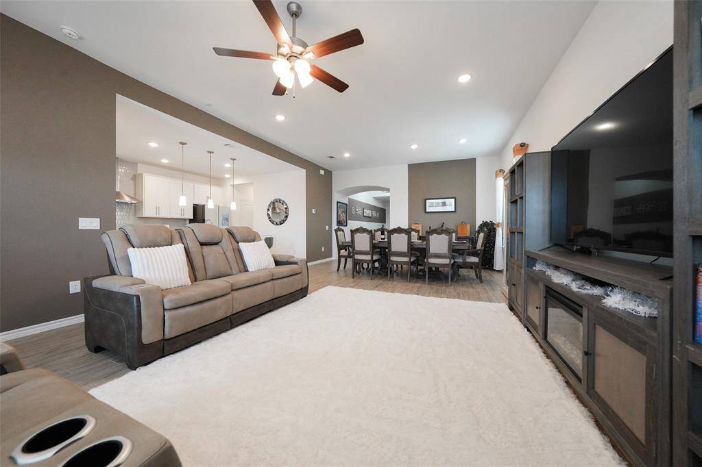 Bright and generously sized living area located right next to the dining room for effortless flow.