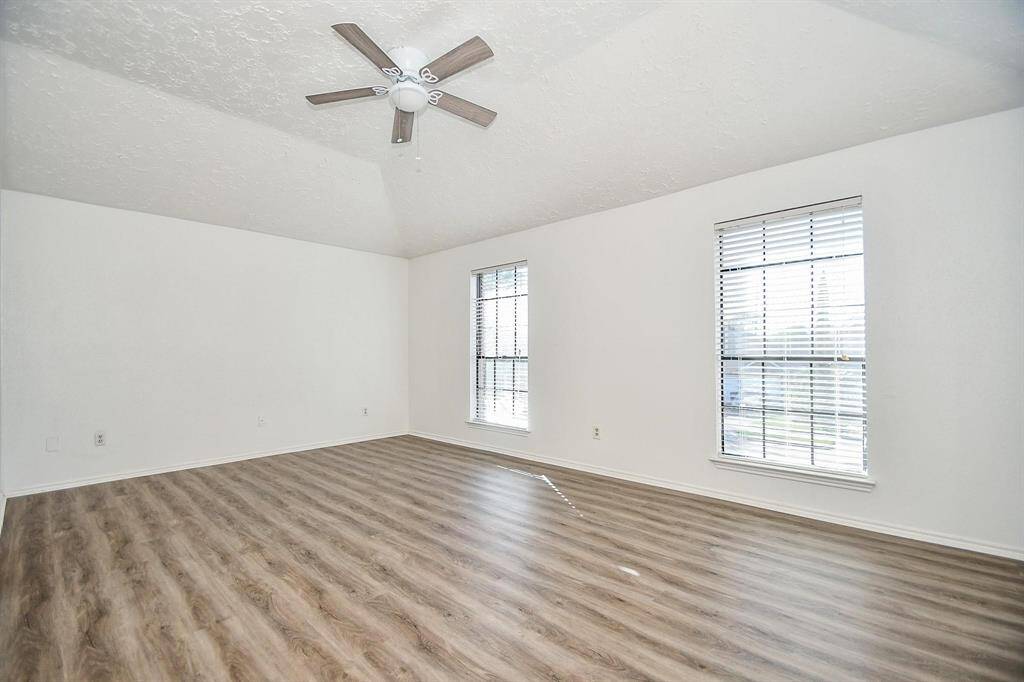 Large primary bedroom with walk in closet