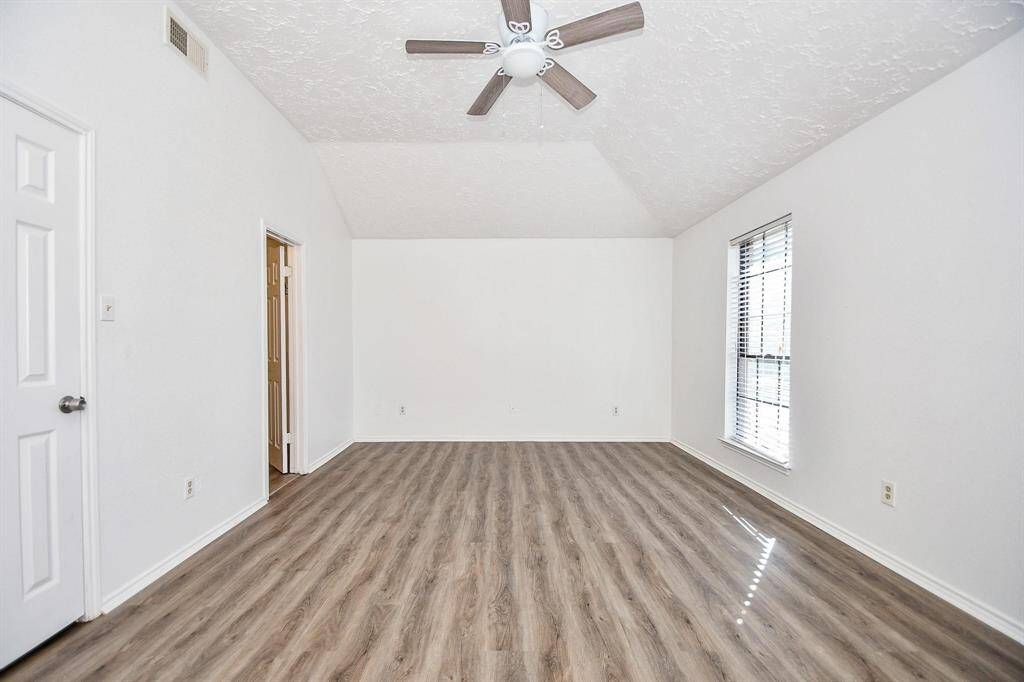 Ceiling fan in primary bedroom
