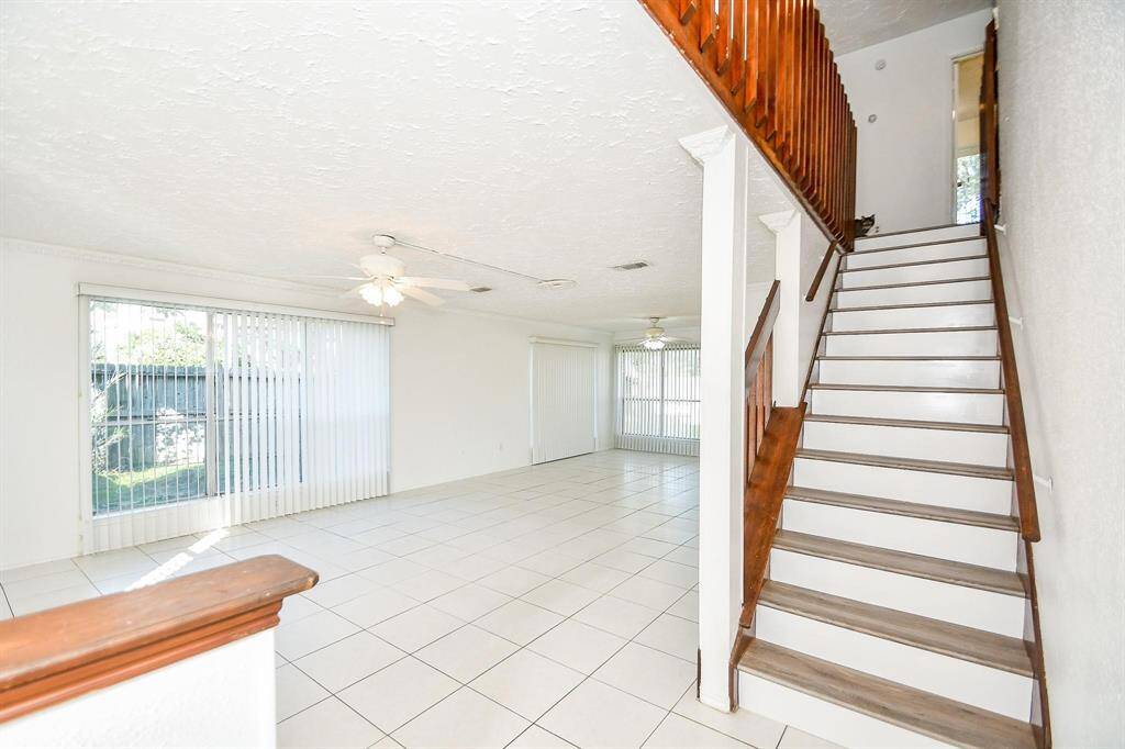 Open entryway into bright family room