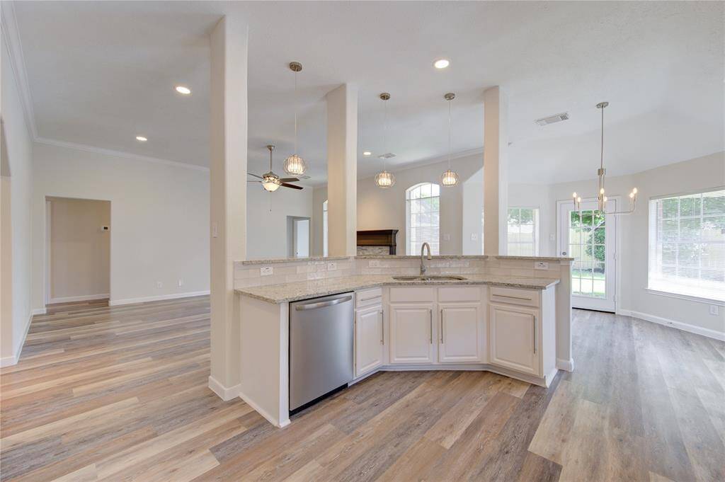The kitchen has a very nice open feeling to the family and breakfast areas