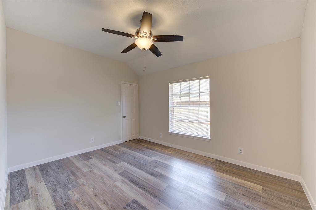Bedroom 2.  All bedrooms have blinds and new ceiling fans.