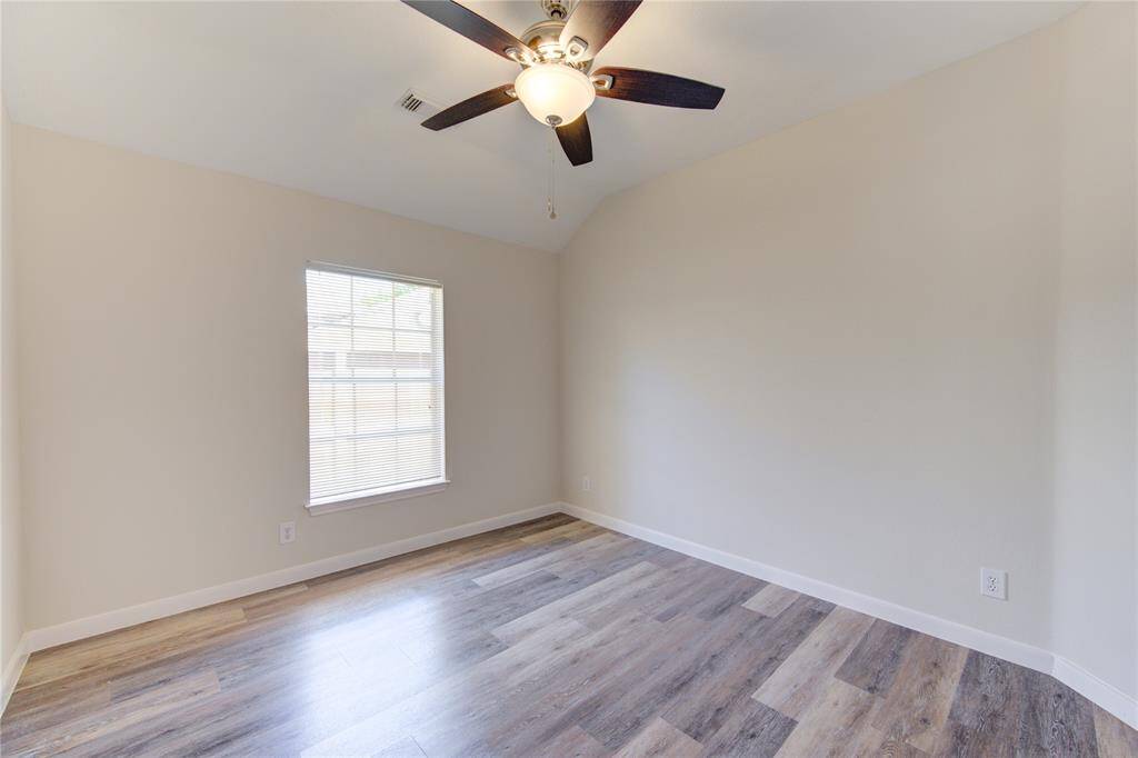 Bedroom 4.  All bedrooms have blinds and new ceiling fans.