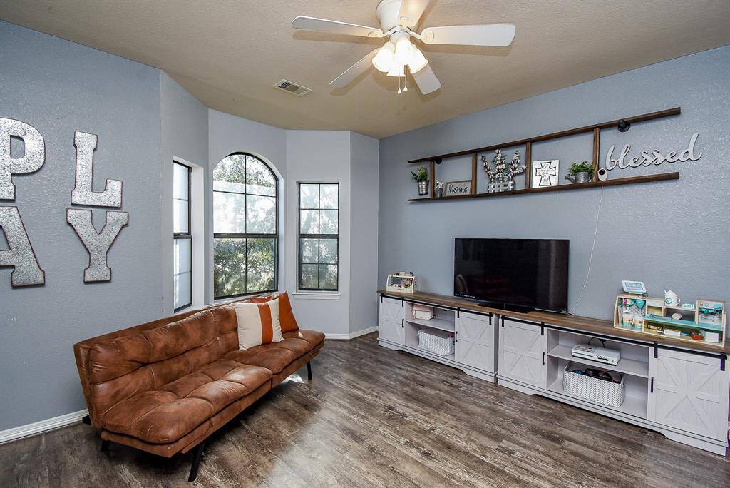 Formal dining area, currently used as a TV/Flex playroom.