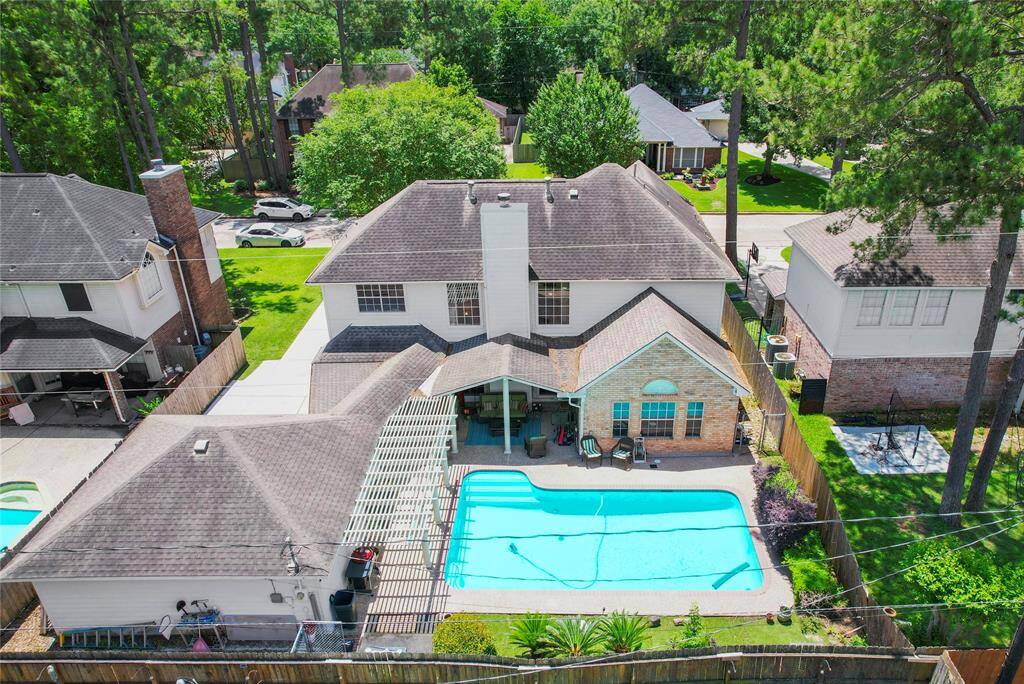 covered patio and outdoor volleyball pool