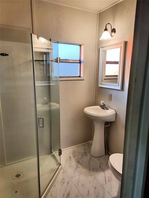 Newly renovated bathroom!  Fresh paint, new shower and new flooring.