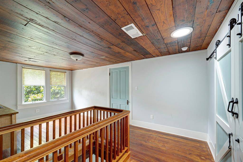 Upstairs landing.  Washer and dryer behind sliding doors on right.