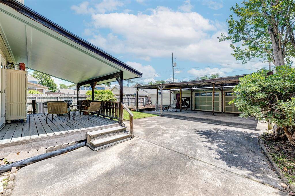 Rear porch and carport.