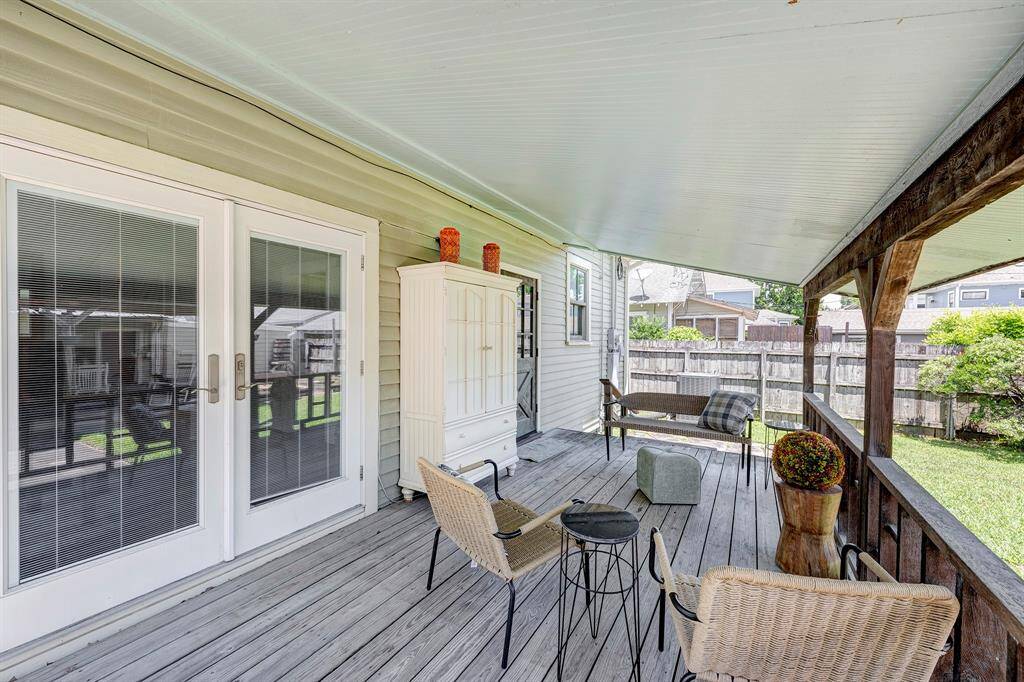Rear deck with french doors that open to study/bedroom.