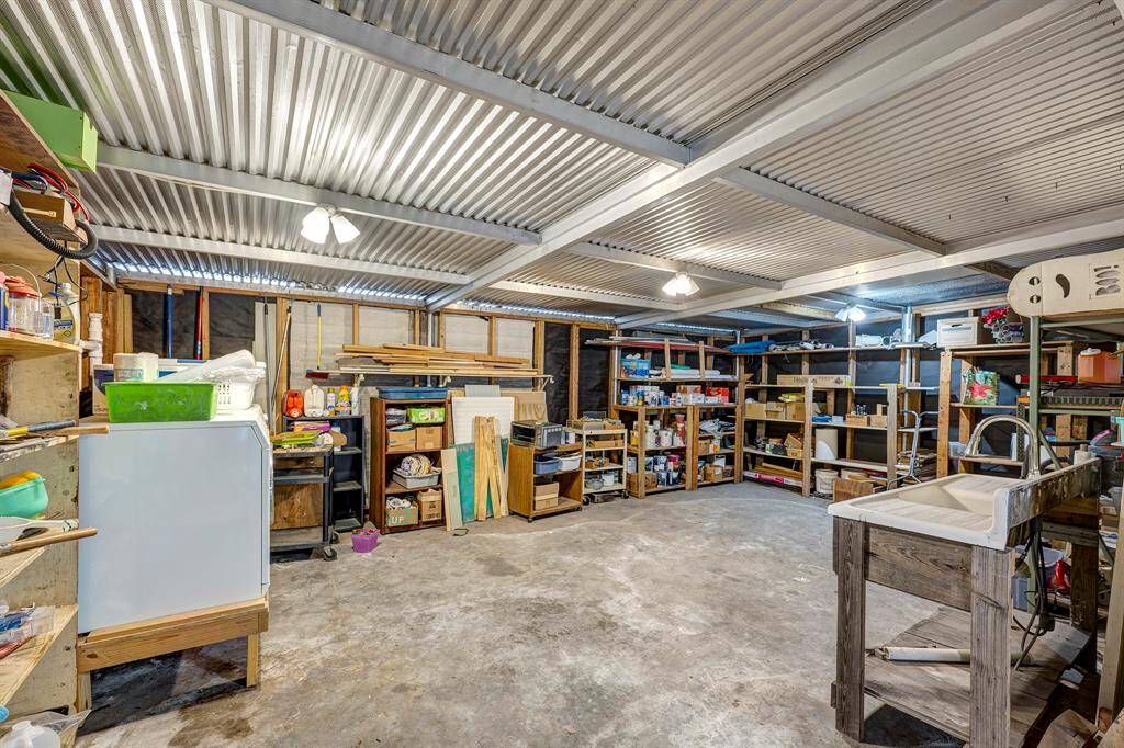 Large workroom next to garage.