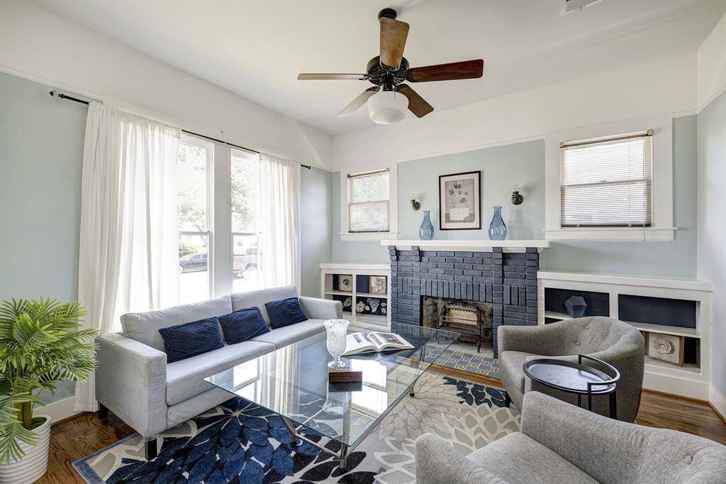 living room with mock fire place.