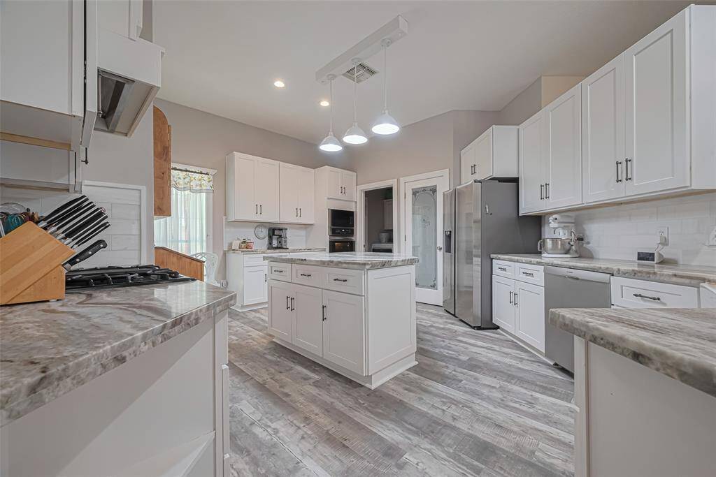 TONS of storage here AND separate built in oven!