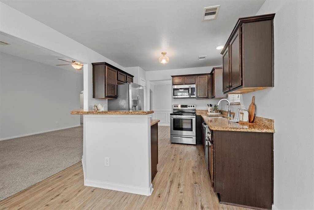 Cozy breakfast bar with space for barstools.