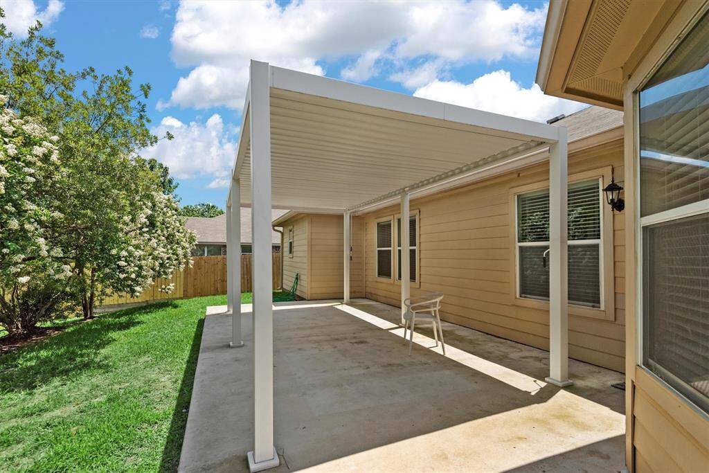 Huge covered patio perfect for relaxing in the breeze!