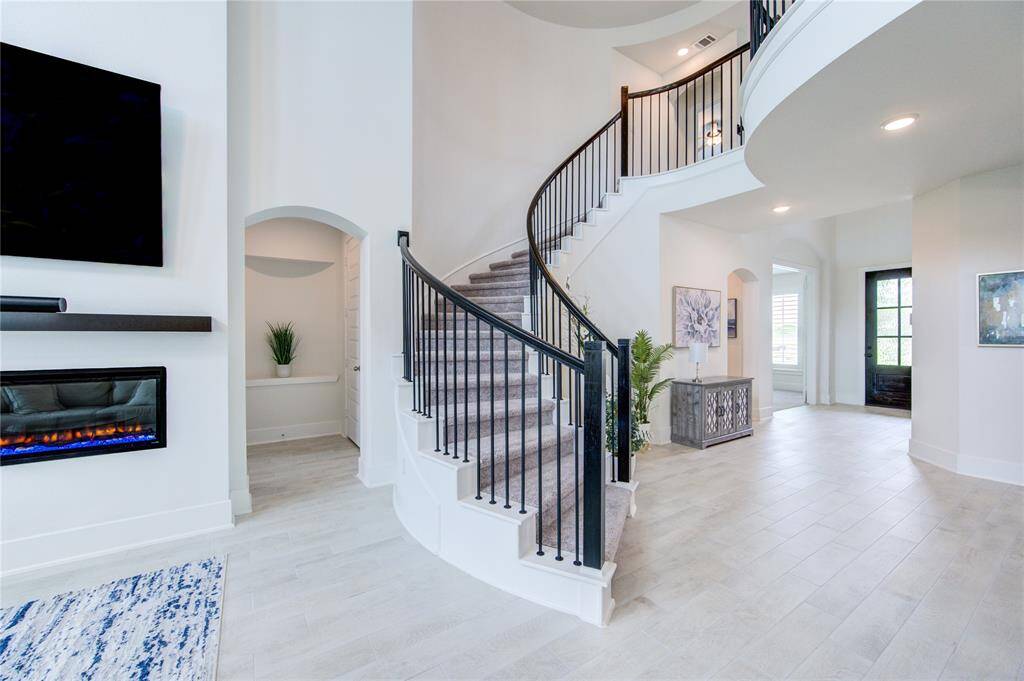 Spacious and inviting den with elegant design, perfect for relaxation and entertaining.