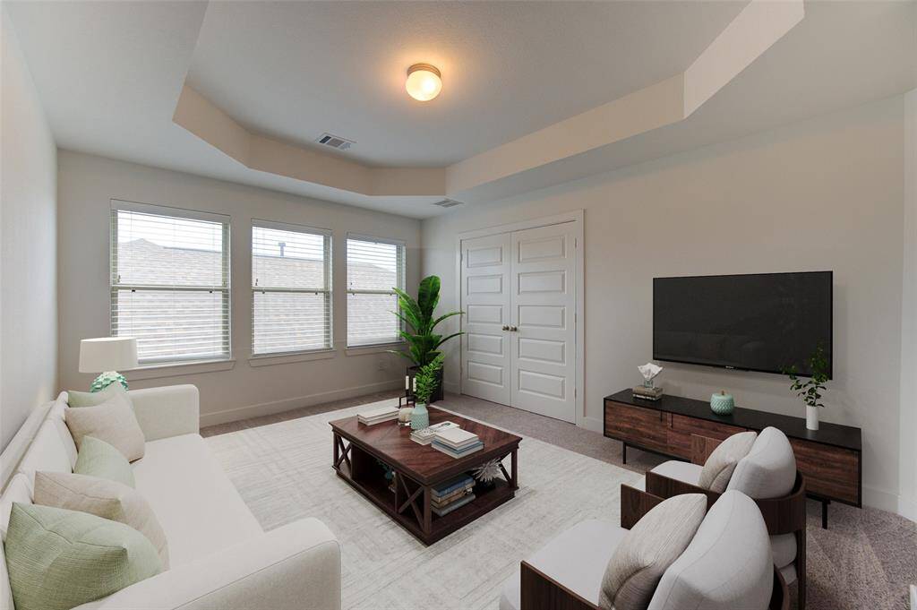 Charming game room with elegant ceiling details, beautifully virtually staged for inspiration.