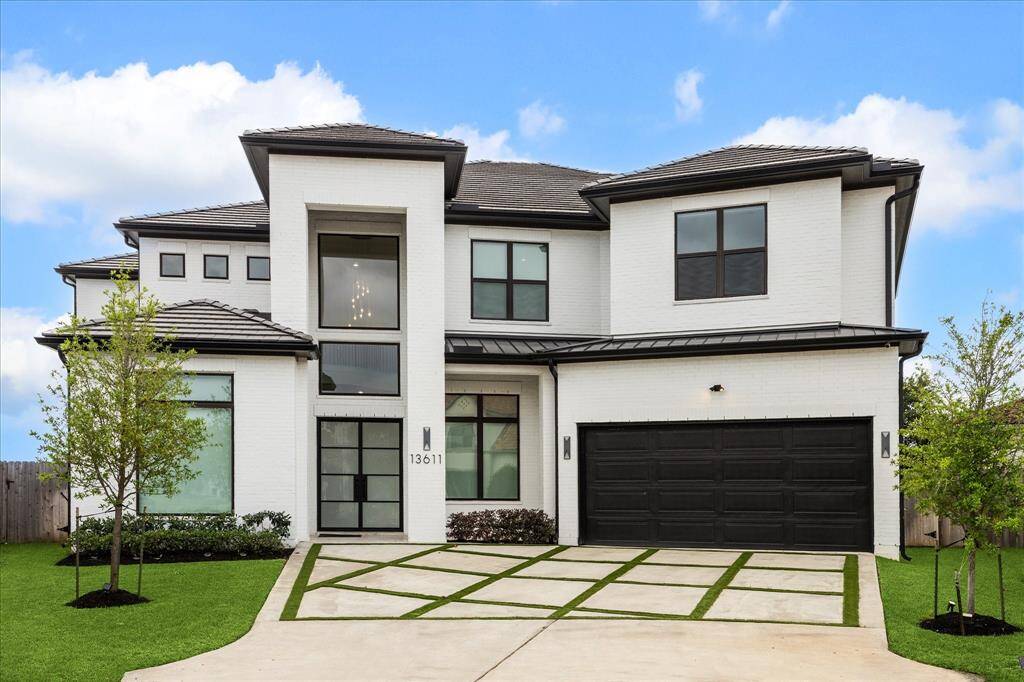 Elegant Kickerillo custom home with classic tile roofing, a generous 3-car garage, nestled on a quiet cul-de-sac.