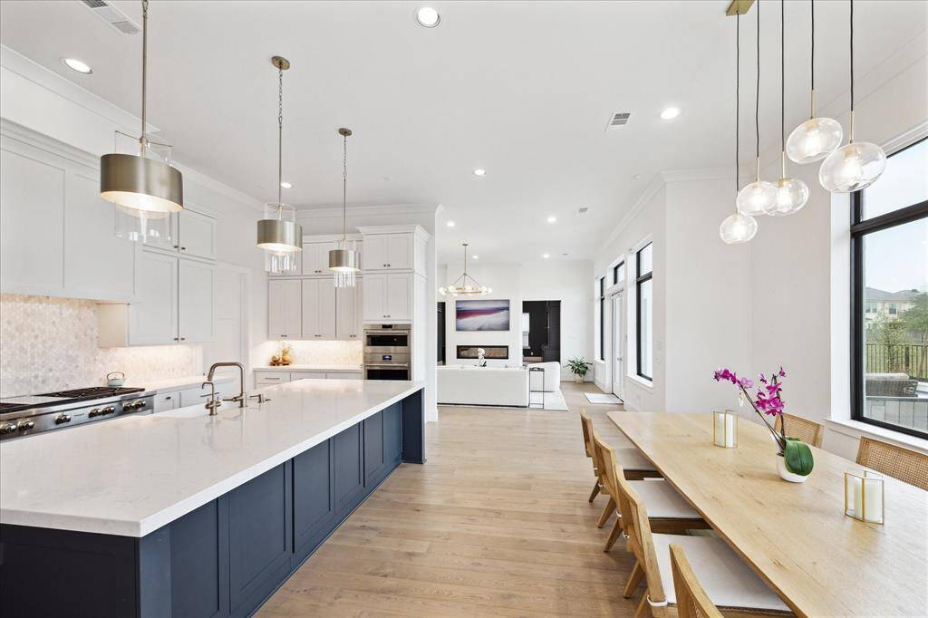 The spacious breakfast area comfortably accommodates a large table, perfect for casual dining.