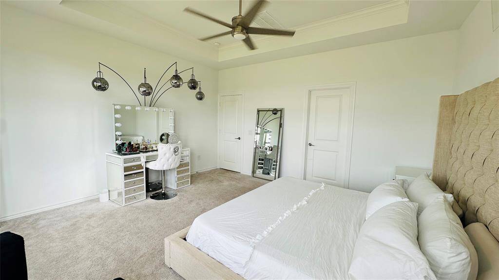 another view of the primary bedroom on the 1st floor