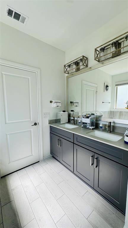 primary bathroom with double sink