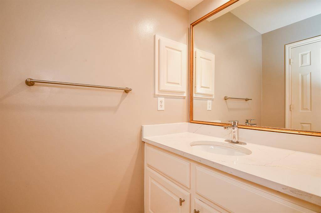 Updated quartz countertops, clean and modern look.