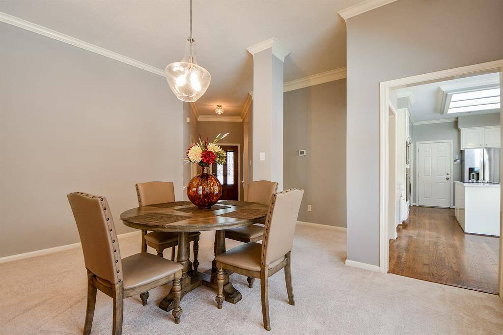 Open dining room to kitchen and living room.