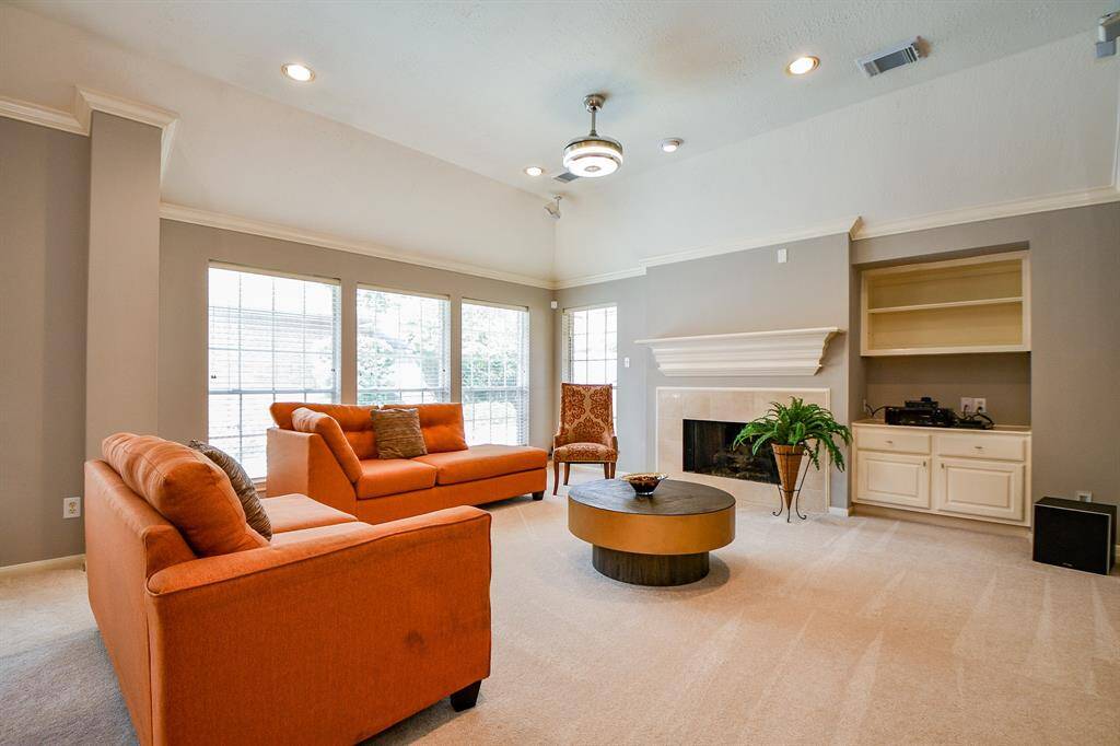 Fireplace and built in provide efficiency in this room.