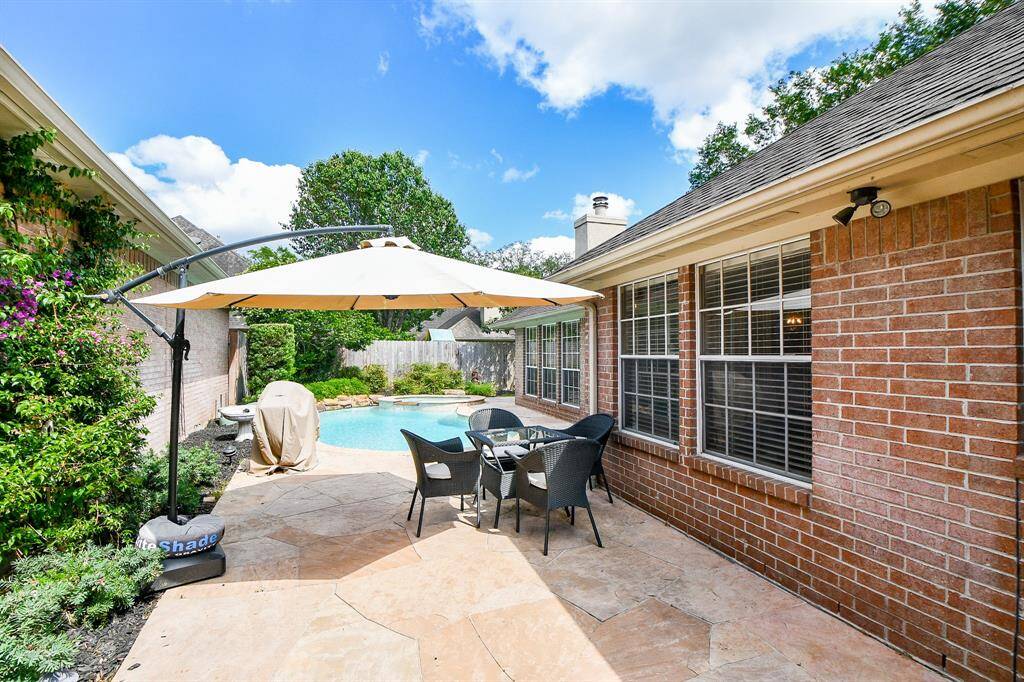 Entertain here in the beautiful private backyard.