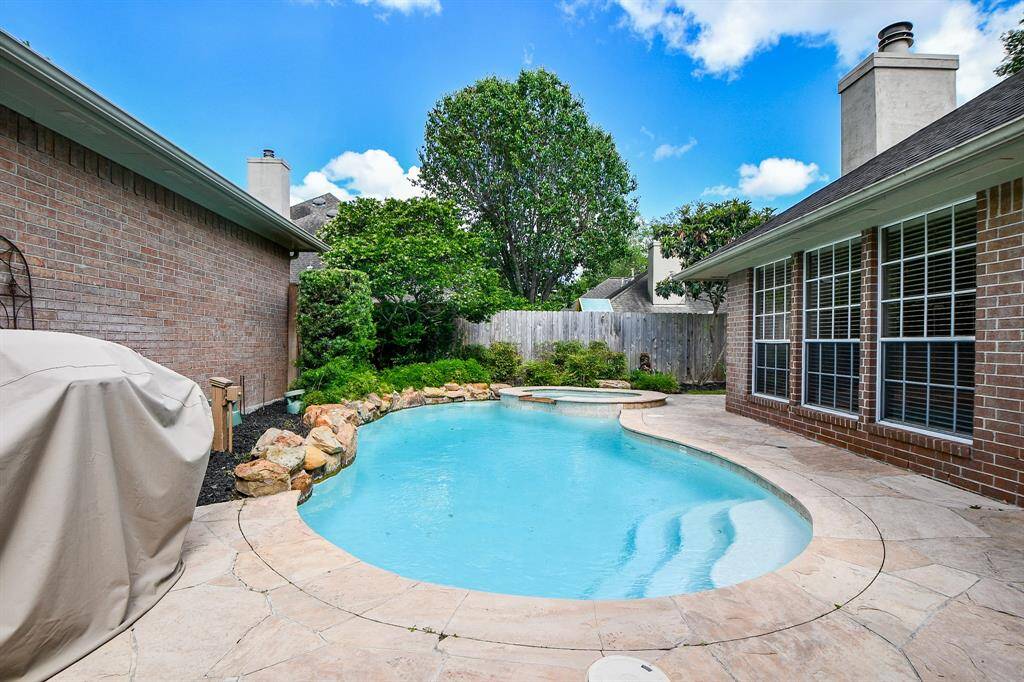 Pool/spa has large ideal patio perfect for shade and to stage your patio furniture.