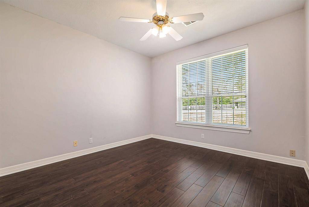 Another spacious secondary bedroom with a walk-in closet.