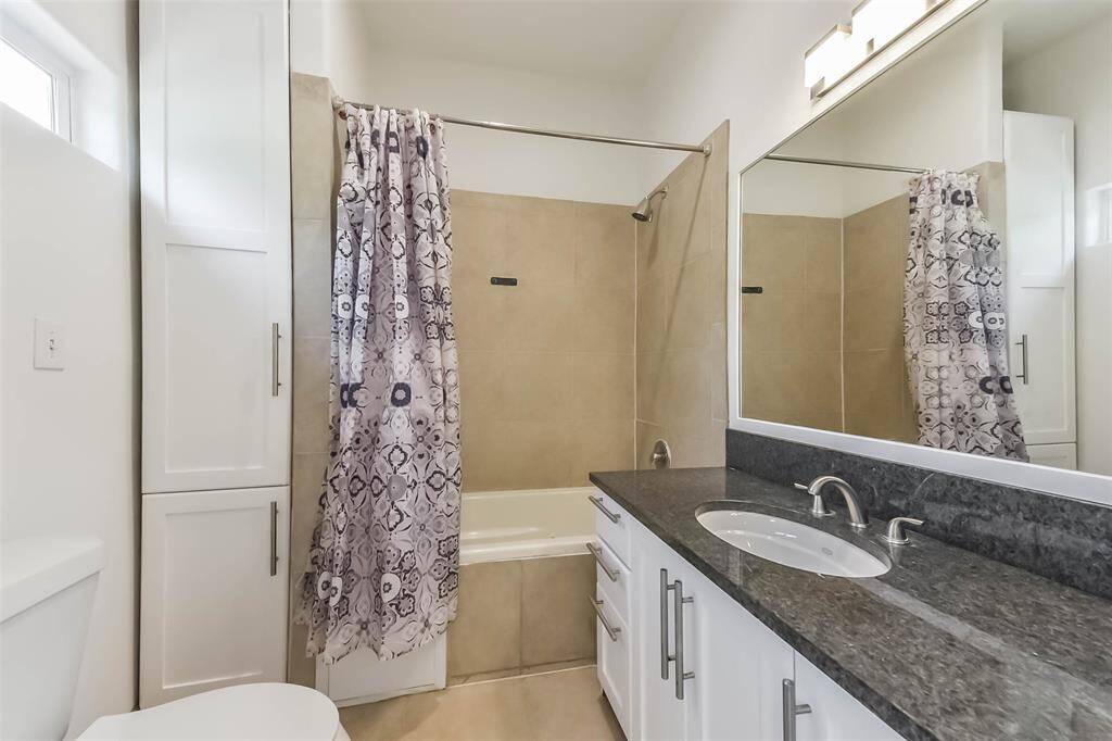 Granite counters, tile in the bathroom and jetted tub.