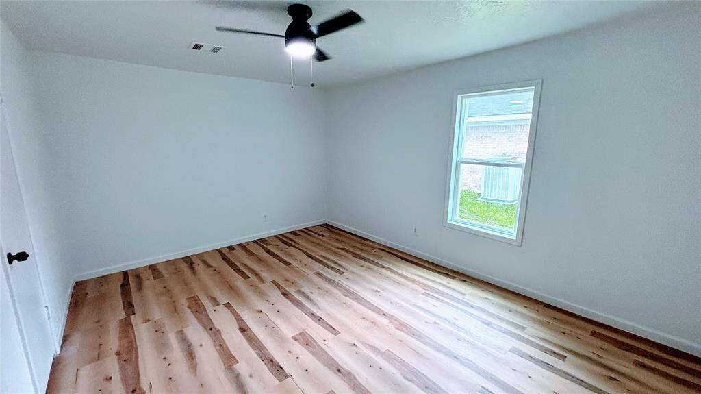 Another view of the bright bedroom # 1.