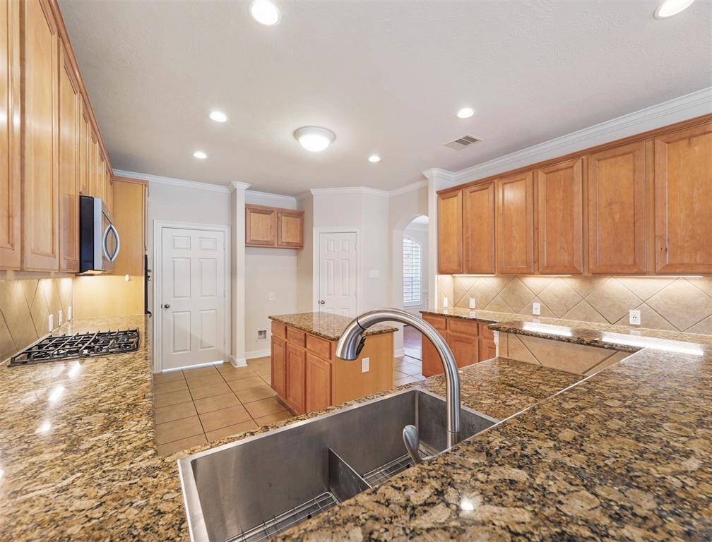 Another view of this striking chef's kitchen. Notice the deep sink!