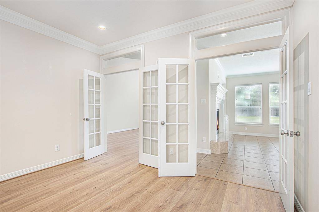 Work from home in this spacious study with two french doors!