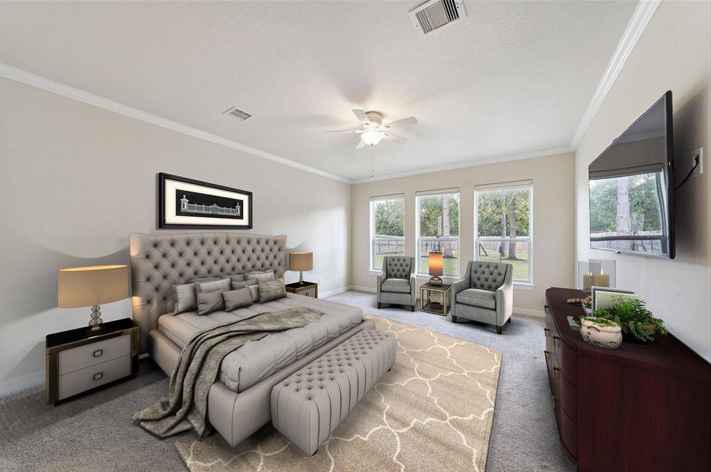 Magnificent primary retreat with views of the backyard! (Virtually Staged)