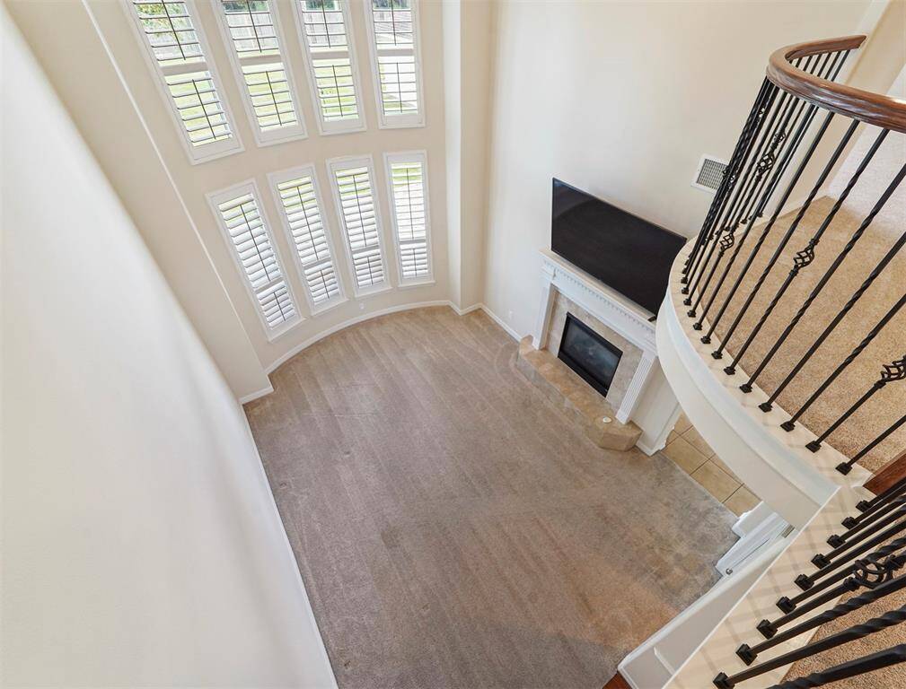 View of the spacious formal living from upstairs.