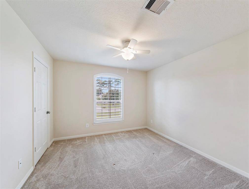 This secondary bedroom is perfect for guests or children!
