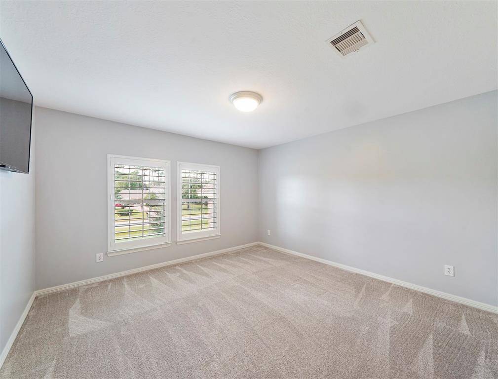 Fourth upstairs bedroom is spacious with great closet space!